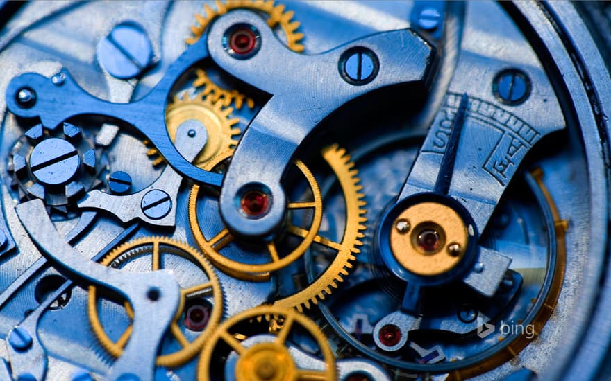 Gears and rubies inside an antique watch